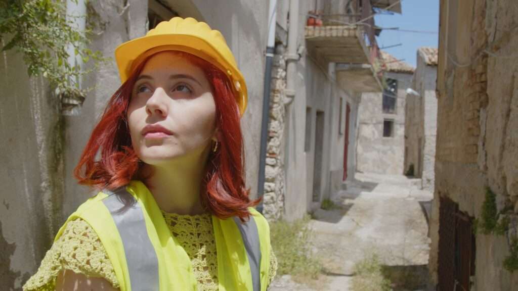 Young girl engineer checks the city after earthquake disaster